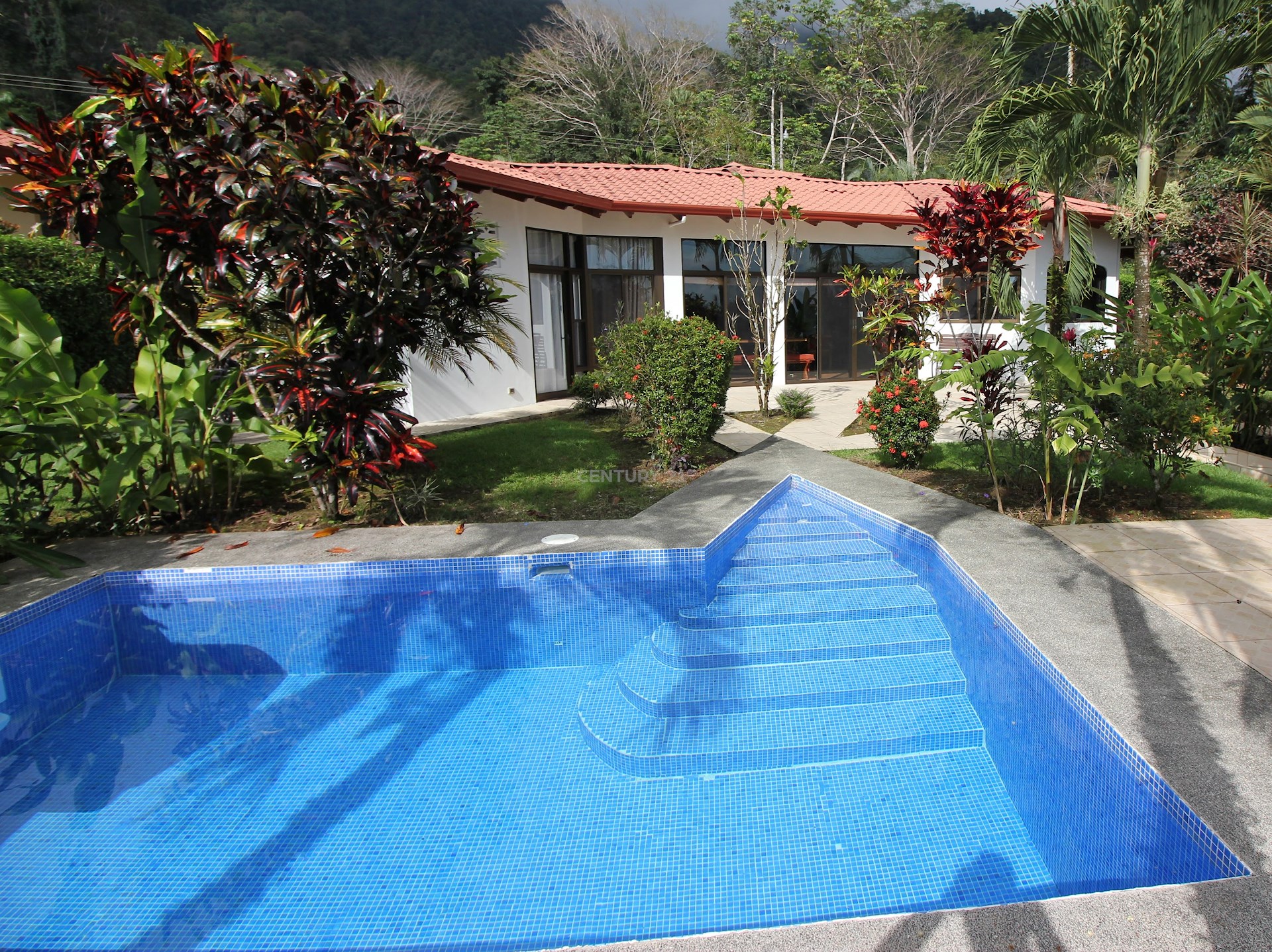0.17 ACRES - 4 Bedroom Home With Pool And Small Ocean Window!!