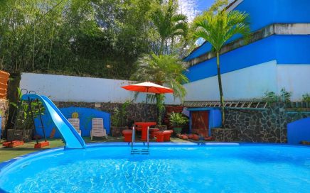 0.13 ACRES – 12 Room Hotel With Pool Plus 3 Bedroom Apartment Walking Distance To The Beach And National Park!!!