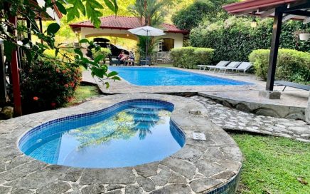 0.95 ACRES – 3 Bedroom Riverfront Home With Stunning Gardens, Tilapia Pond, And Many Fruit Trees!!!